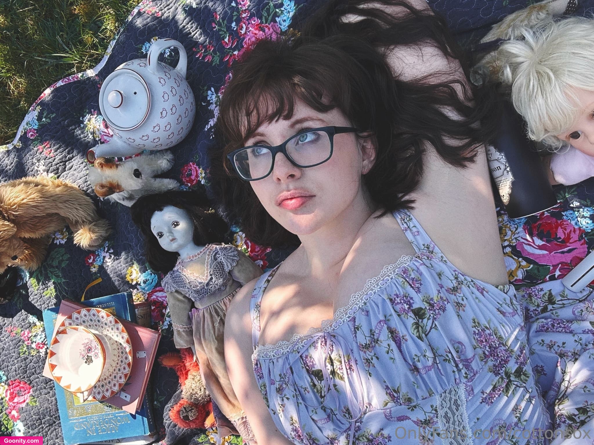 Alice CottonSox on OnlyFans - I got a fancy dress and did a fancy photoshoot. Well, it’s not really a fancy photo shoot, I just had a picnic in my back garden and took photos of myself but it’s fancier than my usual photoshoots because I was wearing a fancy dress. It makes me feel like a book character, or a dolly or something such. Sometimes I wish I were a dolly for real; a lot of the time I feel like a dolly, helplessly at the whims of other people, something to play with and break and fix and dress up. Perhaps if I were