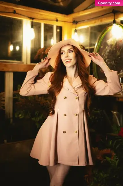 Clarus Polaris Smiling In Pink Coat And Hat Nude OnlyFans Photo